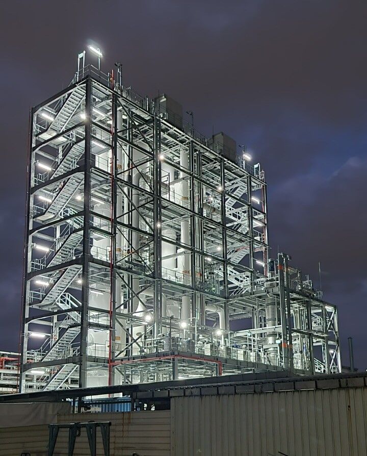 Illuminated industrial water treatment facility at Singapore representing Gradiant’s digital transformation and AI-driven optimisation following the acquisition of Synauta.